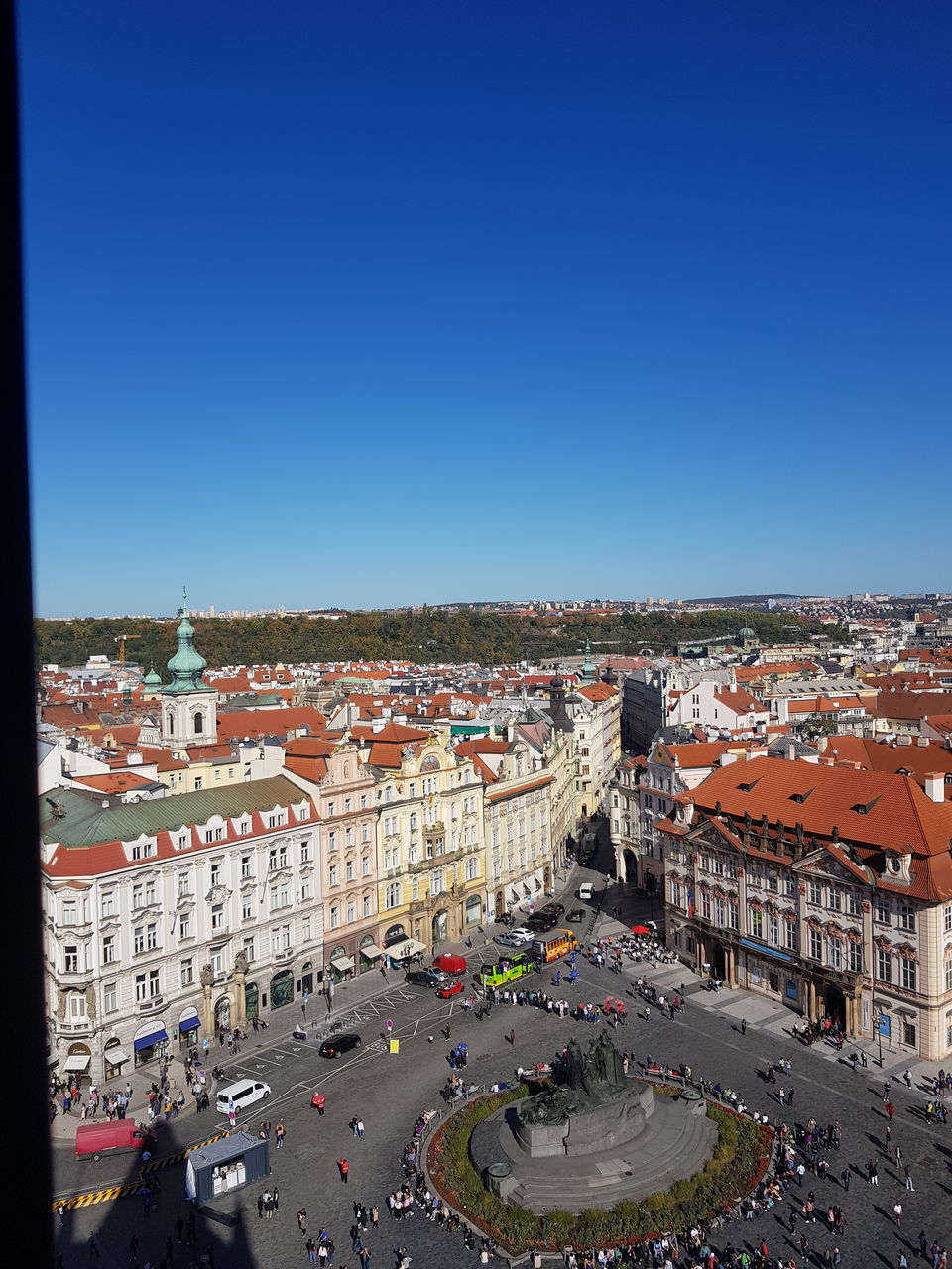 HIGH ANGLE VIEW OF CITY STREET AGAINST CLEAR SKY