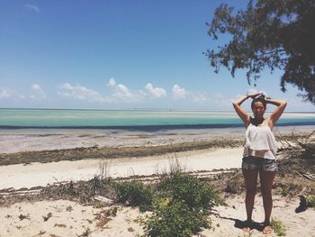 Woman standing on beach