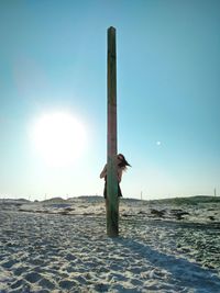 Full length of woman jumping in water