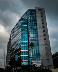 Low angle view of modern building against sky