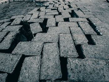 High angle view of stones on footpath