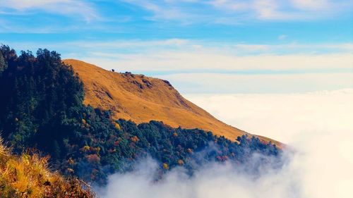 Scenic view of majestic mountains against sky