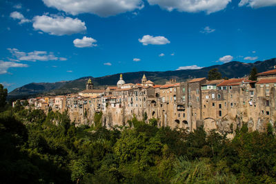 Panoramic shot of old buildings against sky