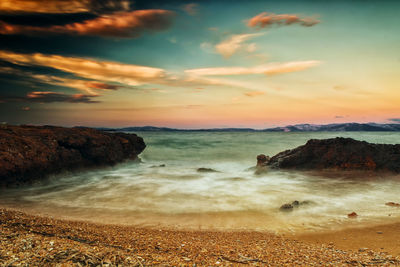 Scenic view of beach against sky