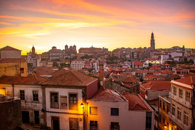 Cityscape against sky during sunset