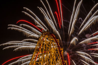 Firework display at night