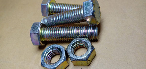 High angle view of metallic container on table