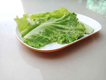 High angle view of vegetables in plate on table
