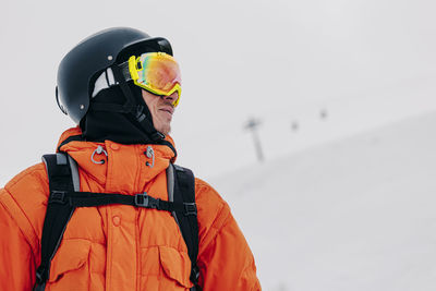 Skier wearing ski goggles and helmet