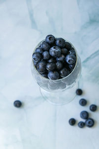 Fresh blueberries in wine glass. blueberry antioxidant organic superfood in a bowl concept 