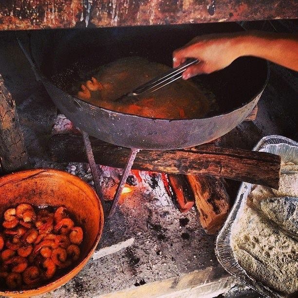 food and drink, preparation, food, kitchen utensil, heat - temperature, household equipment, human hand, hand, freshness, real people, high angle view, human body part, one person, container, eating utensil, preparing food, unrecognizable person, healthy eating, spoon, finger