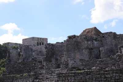 Low angle view of old ruin building against sky