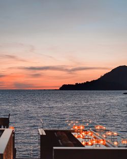 Scenic view of sea against clear sky during sunset