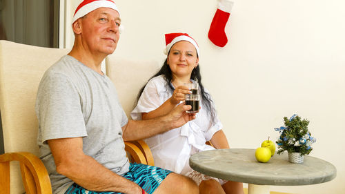Man and woman celebrating christmas