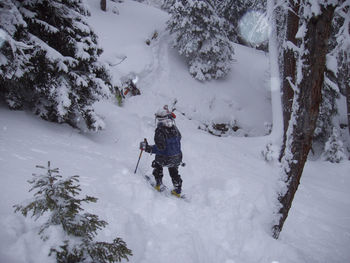 Full length of person on snow covered land