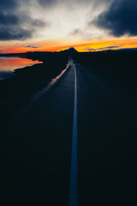 Scenic view of landscape against sky at sunset