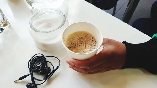 High angle view of coffee cup on table