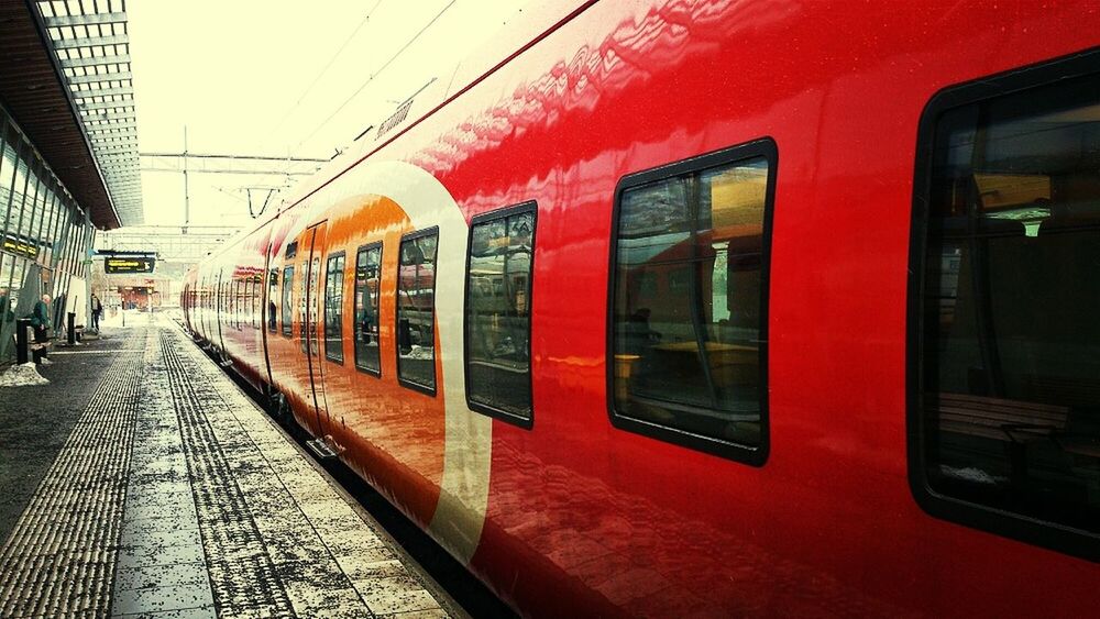 RAILROAD TRACKS AT RAILROAD STATION PLATFORM