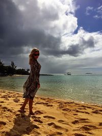 Silhouette of person standing on beach