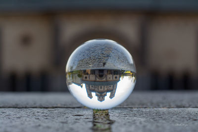 Reflection of maria laach abbey on crystal ball
