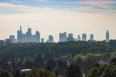 Buildings in city against sky