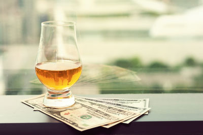 Close-up of beer in glass on table