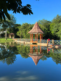 Reflection of built structure in lake