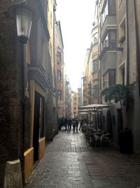 People walking on street in city