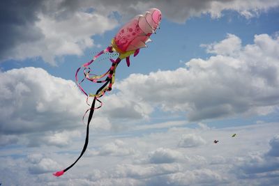 Low angle view of airshow against sky