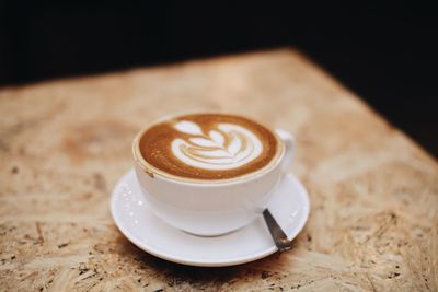Close-up of cappuccino on table