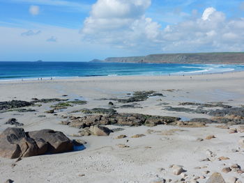 Scenic view of beach against sky