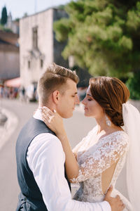 Young couple standing outdoors