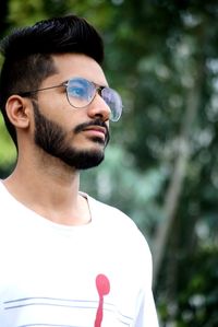  indina person and portrait of young man wearing sunglasses