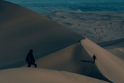 High angle view of man on shore during winter