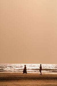 Scenic view of sea at sunset