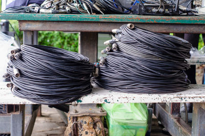 Close-up of clothes hanging on metal