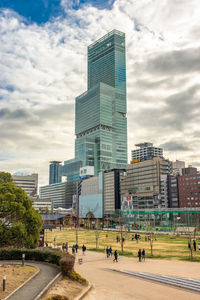 Modern buildings in city against sky