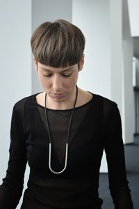 Portrait of young man standing outdoors