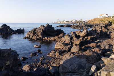 Scenic view of sea against clear sky