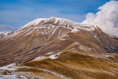 Scenic view of snowcapped mountain against sky in italy 