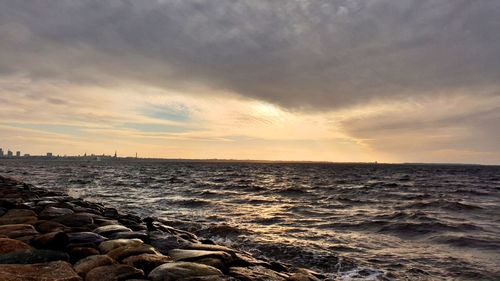 Scenic view of sea against sky during sunset