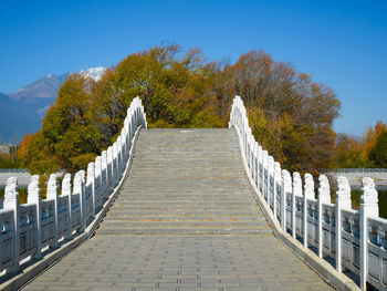 People walking on footbridge