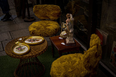 High angle view of cat sitting on table at home