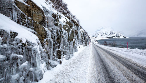 Snow covered road in lofoten