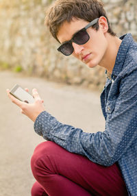 Young woman using mobile phone