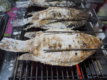 Close-up of meat on barbecue grill