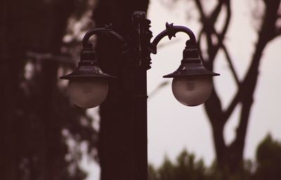 Close-up of street light against sky