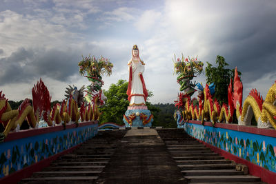 Low angle view of statue against sky