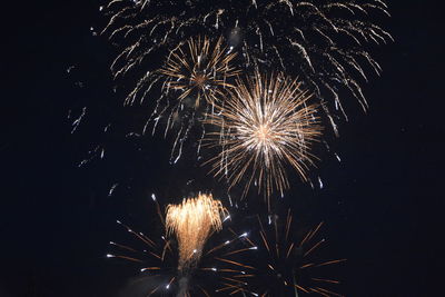 Firework display at night