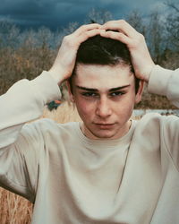 Portrait of young man with eyes closed